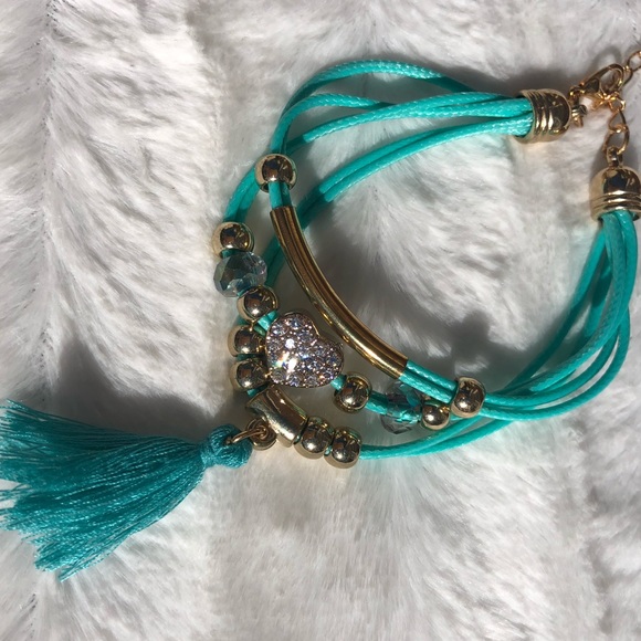Beautiful teal banded bracelet with jeweled heart - Picture 5 of 11